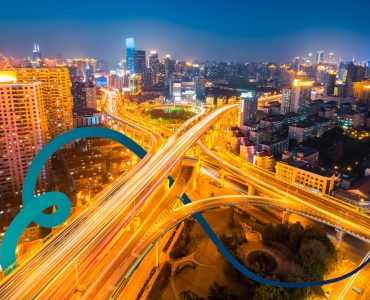 an aerial view of a city at night