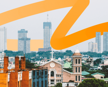 a picture of a city with buildings in the background