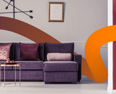a living room with a couch and a table