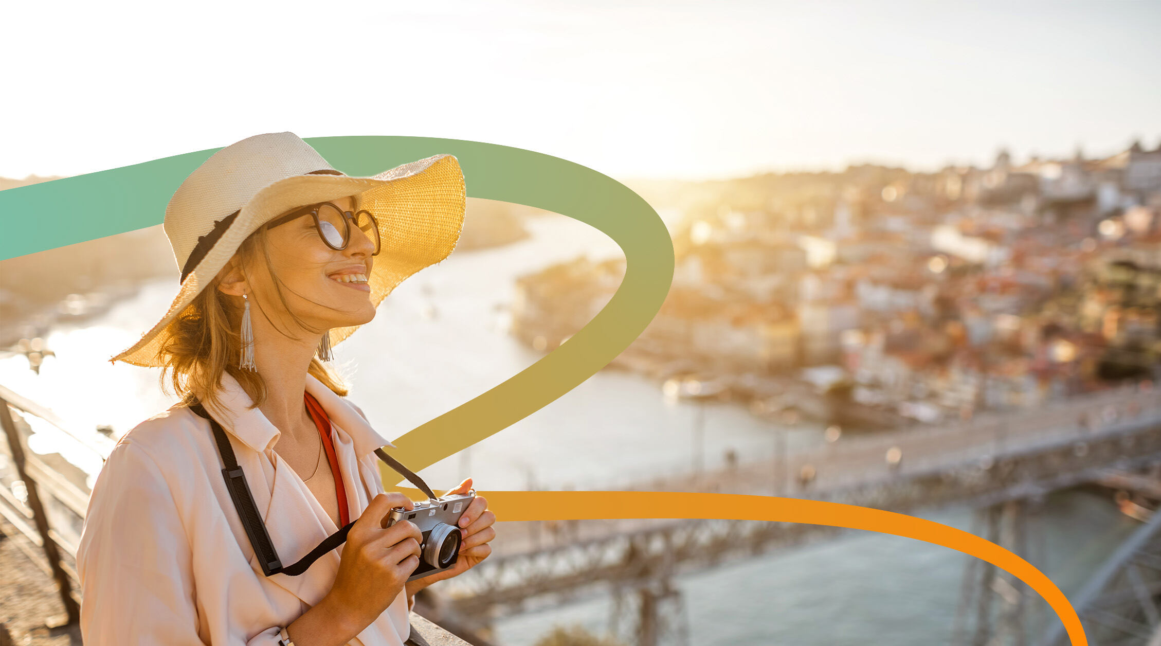 a woman wearing a hat and holding a camera