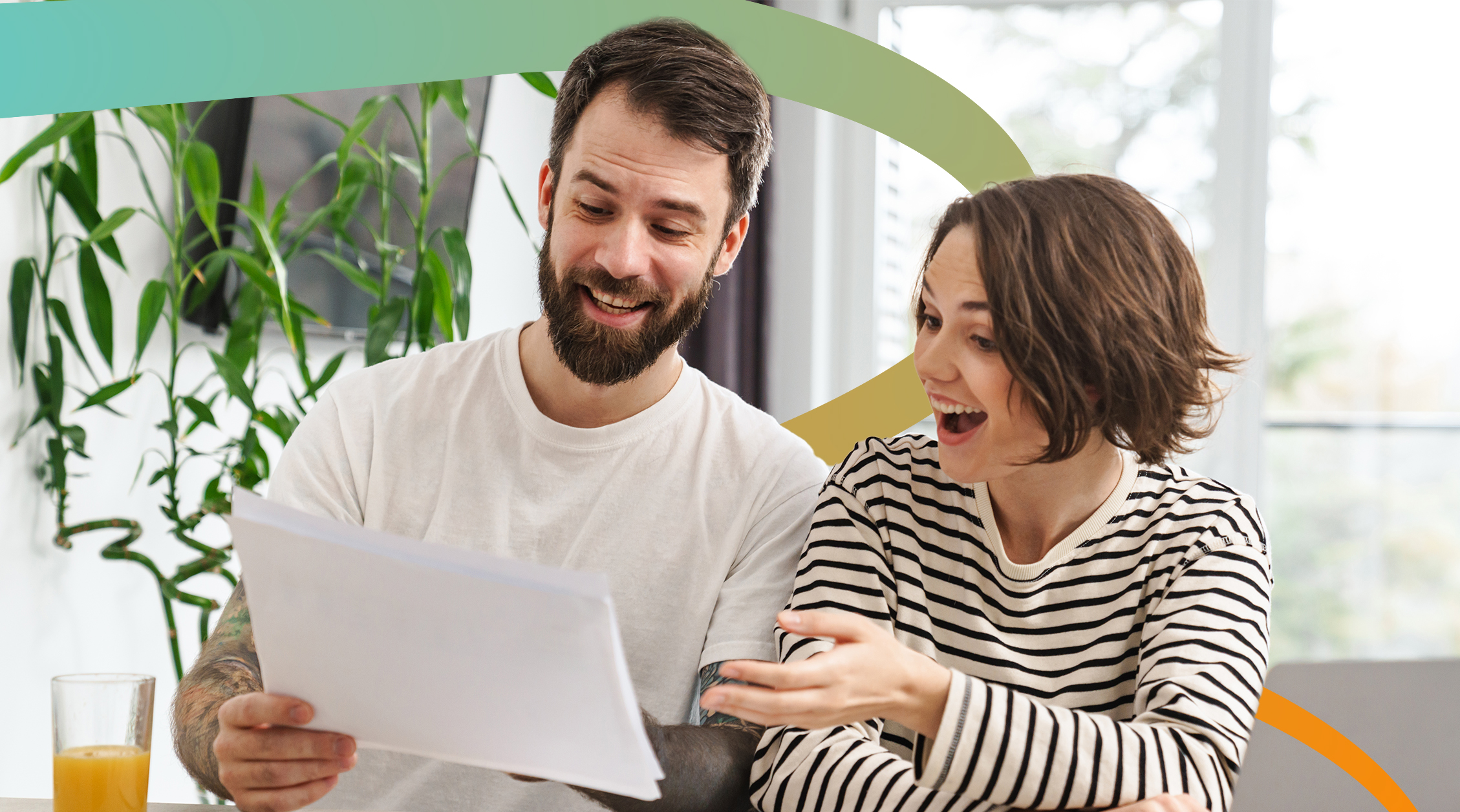 a man and woman looking at a piece of paper