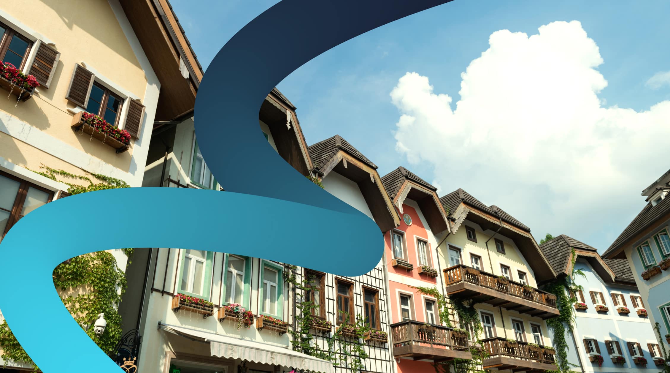a street sign in front of a row of houses